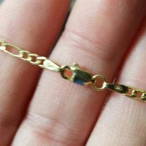 10kt gold Figaro chain. Brand new & never worn